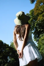 gorro verde y rosa